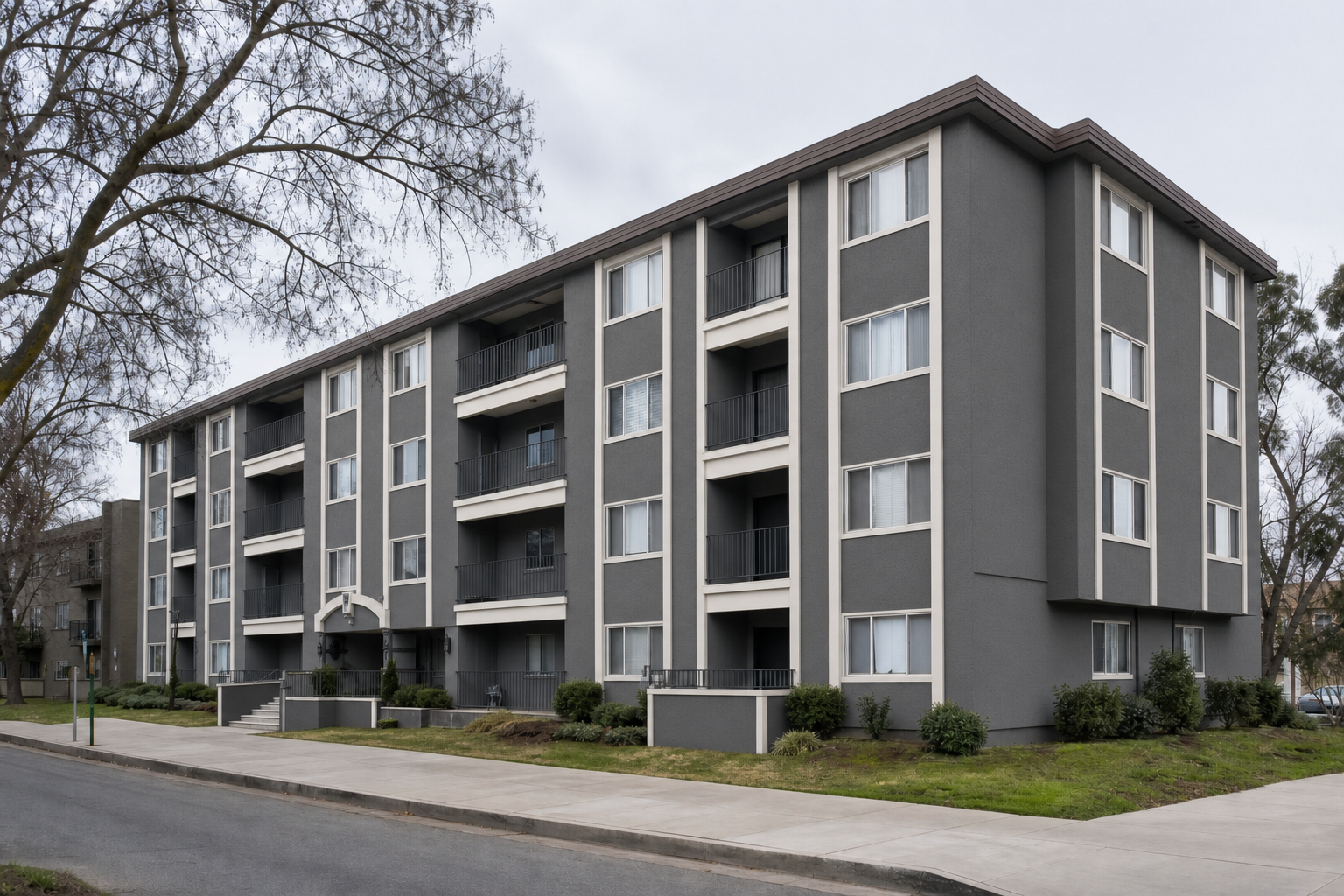 Representative multi-unit building in a modern charcoal and white finish
